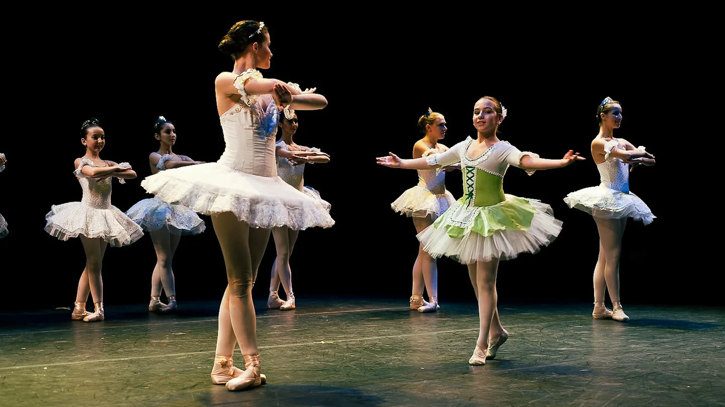 Nika students in a classical ballet performance